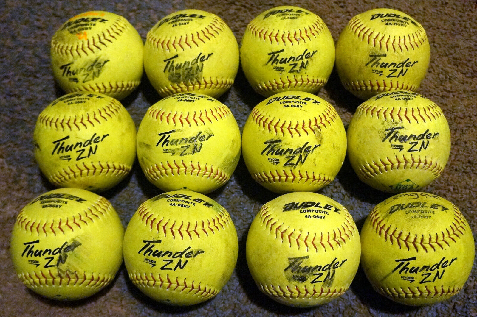 Dudley Thunder Zn Softballs, Used, 12-12 Inch, W/ Writing And Scuffs.