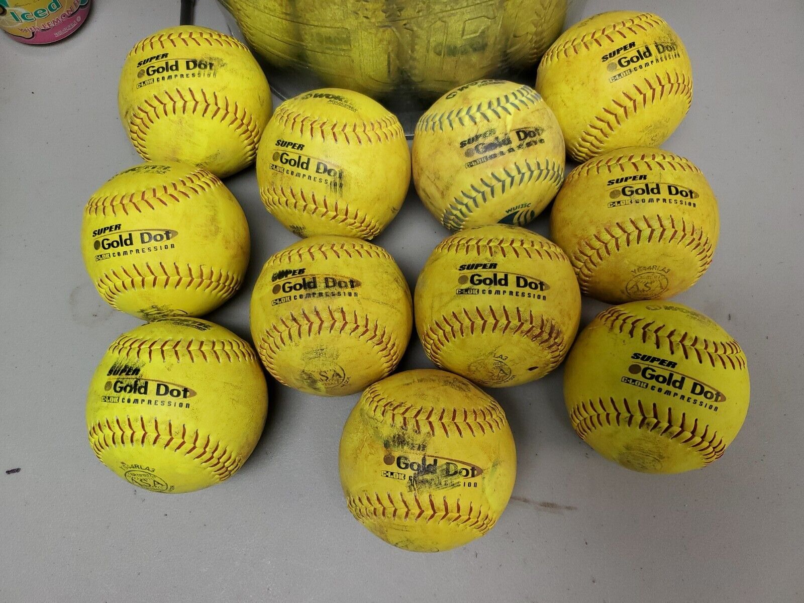 11 Softballs Used Slow Pitch - Worth Gold Dot C-lok Compression Yellow